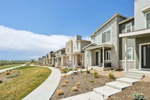 surrounding community with a residential view