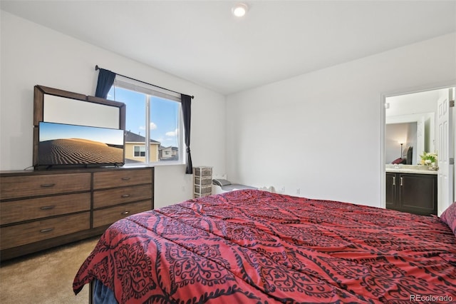 bedroom featuring light carpet