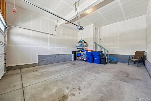 garage featuring a garage door opener