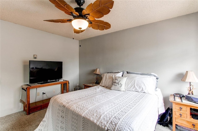 2280 S Oswego Way Unit 303, Aurora, CO 80014 - bedroom with carpet, a textured ceiling, and ceiling fan