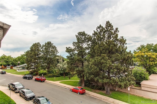 2280 S Oswego Way Unit 303, Aurora, CO 80014 - view of asphalt road featuring curbs and sidewalks