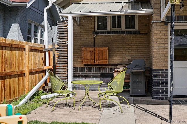 view of patio / terrace with fence