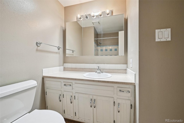 3784 Swadley St, Wheat Ridge, CO 80033 - bathroom with vanity and a shower