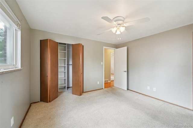 3784 Swadley St, Wheat Ridge, CO 80033 - unfurnished bedroom with light colored carpet and a ceiling fan