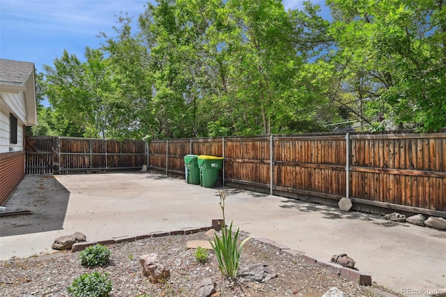 3784 Swadley St, Wheat Ridge, CO 80033 - fenced backyard featuring a patio area