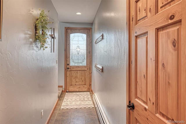 10757 Vista Farms Ct, Salida, CO 81201 - entryway featuring baseboards and baseboard heating