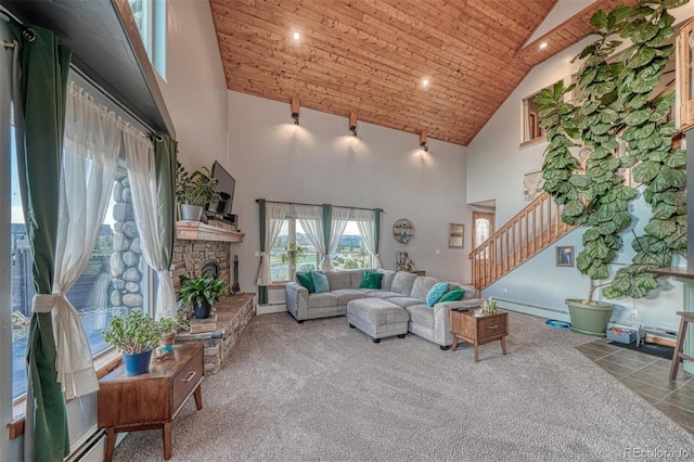 10757 Vista Farms Ct, Salida, CO 81201 - carpeted living area with high vaulted ceiling, stairs, wood ceiling, a fireplace, and recessed lighting