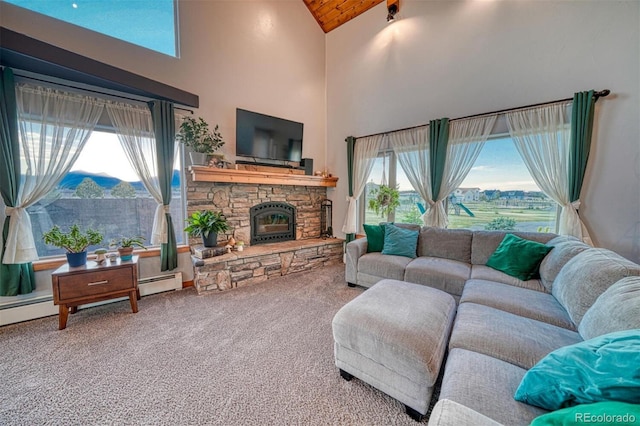 10757 Vista Farms Ct, Salida, CO 81201 - living room featuring carpet flooring, high vaulted ceiling, a stone fireplace, a baseboard heating unit, and wooden ceiling