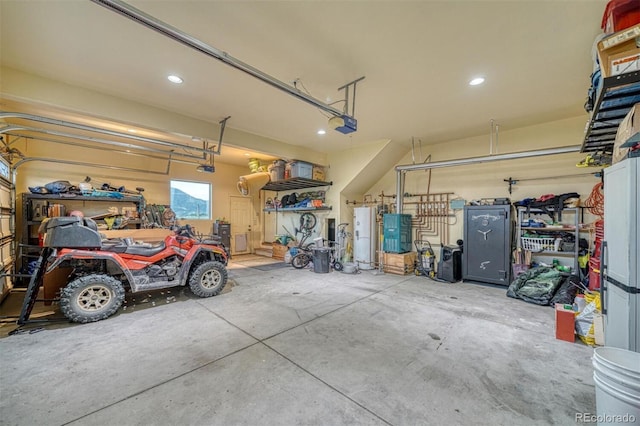10757 Vista Farms Ct, Salida, CO 81201 - garage featuring recessed lighting and a garage door opener
