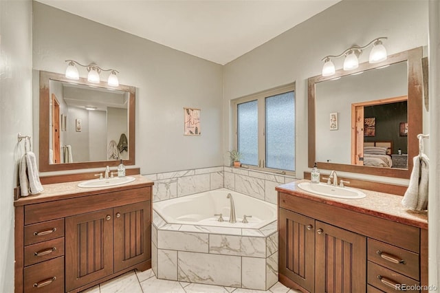 10757 Vista Farms Ct, Salida, CO 81201 - full bathroom featuring ensuite bathroom, two vanities, and a bath