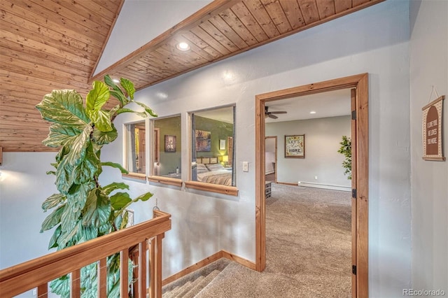 10757 Vista Farms Ct, Salida, CO 81201 - hallway with wooden ceiling, carpet, a baseboard heating unit, and recessed lighting