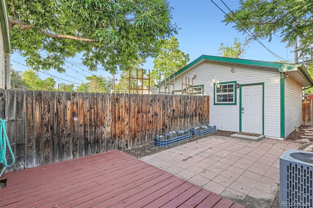 1612 N High St, Denver, CO 80218 - wooden terrace featuring a fenced backyard and a patio area