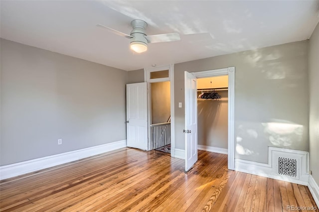 1612 N High St, Denver, CO 80218 - unfurnished bedroom with light wood-type flooring, a closet, and a ceiling fan