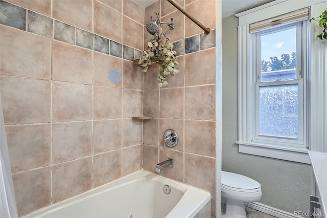 1612 N High St, Denver, CO 80218 - bathroom with toilet and washtub / shower combination