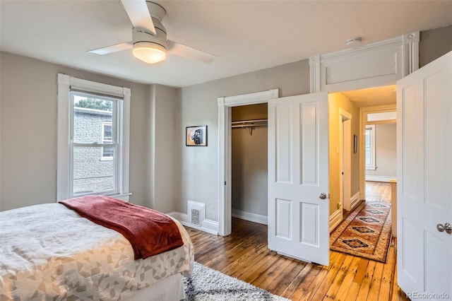 1612 N High St, Denver, CO 80218 - bedroom featuring light wood-style flooring, a ceiling fan, and a closet