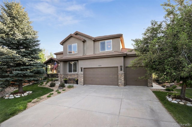 17490 W 67th Ave, Arvada, CO 80007 - view of front facade featuring stone siding, stucco siding, concrete driveway, a garage, and a front yard
