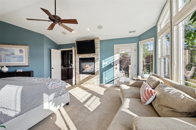 17490 W 67th Ave, Arvada, CO 80007 - bedroom with vaulted ceiling, access to outside, a fireplace, carpet floors, and a ceiling fan