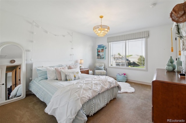 17490 W 67th Ave, Arvada, CO 80007 - bedroom with carpet floors and a chandelier