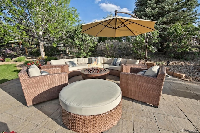 17490 W 67th Ave, Arvada, CO 80007 - view of patio / terrace featuring an outdoor living space with a fire pit