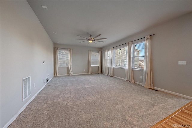 interior space with ceiling fan