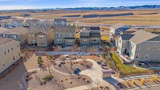 drone / aerial view featuring a mountain view