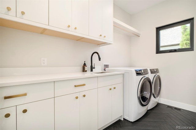 1462 S Vine St, Denver, CO 80210 - laundry room with cabinet space and washer and dryer