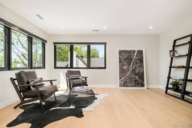 1462 S Vine St, Denver, CO 80210 - living area with light wood-style floors and recessed lighting