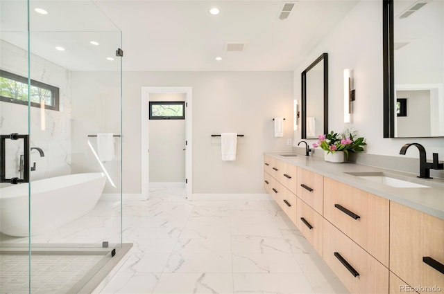 1462 S Vine St, Denver, CO 80210 - full bath featuring marble finish flooring, a soaking tub, double vanity, a marble finish shower, and recessed lighting
