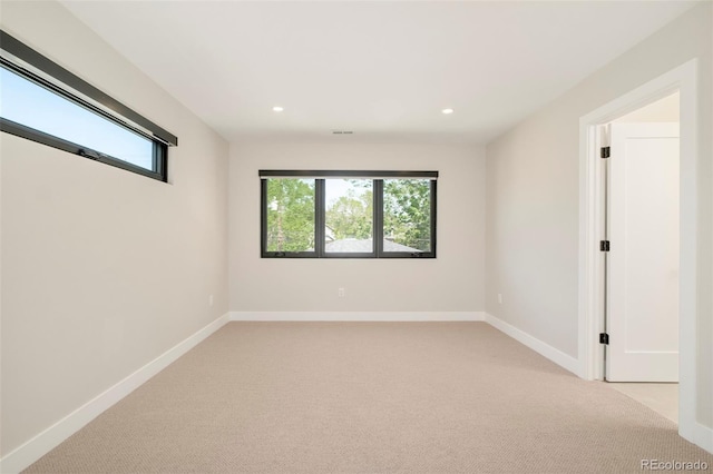 1462 S Vine St, Denver, CO 80210 - empty room with light carpet and recessed lighting