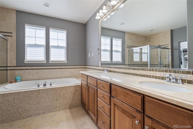 7963 S Valleyhead Way, Aurora, CO 80016 - bathroom with a bath, a stall shower, double vanity, and tile patterned floors