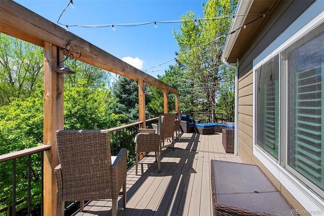 20460 Oakbrook Ln, Parker, CO 80138 - wooden deck featuring an outdoor hangout area