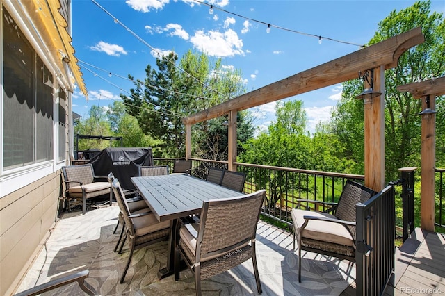 20460 Oakbrook Ln, Parker, CO 80138 - wooden terrace with outdoor dining area