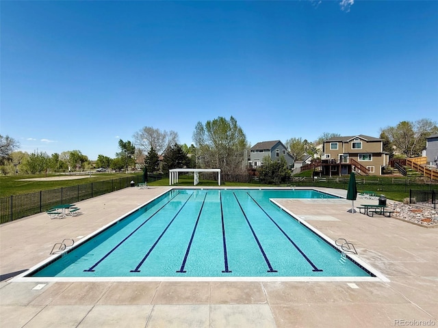 20460 Oakbrook Ln, Parker, CO 80138 - community pool featuring fence, a patio, and a residential view