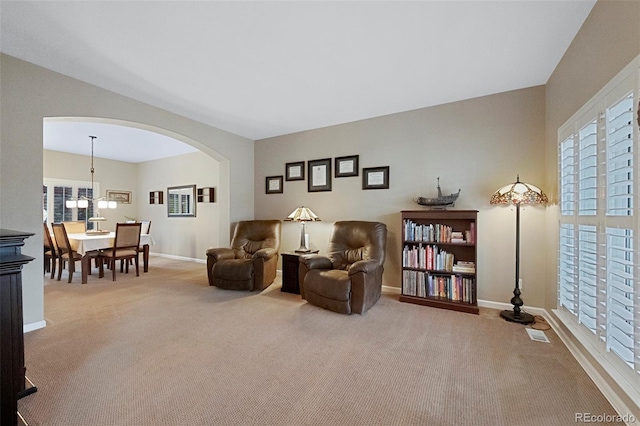 20460 Oakbrook Ln, Parker, CO 80138 - sitting room with carpet, arched walkways, and baseboards