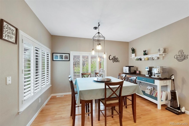 20460 Oakbrook Ln, Parker, CO 80138 - dining room with light wood-type flooring and baseboards