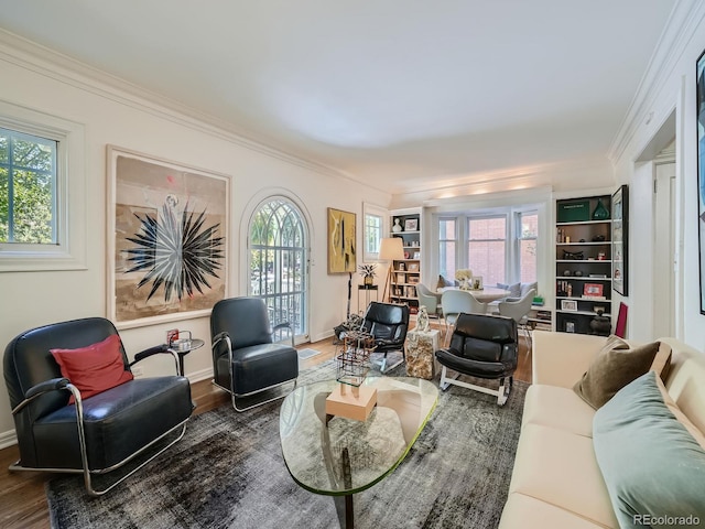 living room with ornamental molding, dark hardwood / wood-style flooring, and a wealth of natural light