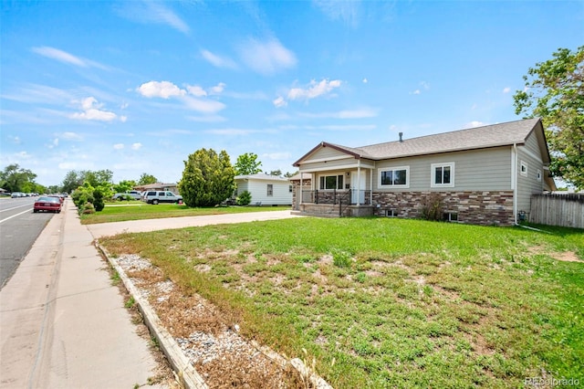335 N 11th Ave, Brighton, CO 80601 - single story home with brick siding