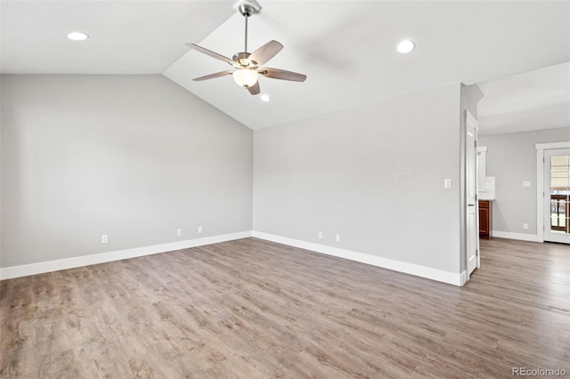 335 N 11th Ave, Brighton, CO 80601 - spare room featuring a ceiling fan, wood finished floors, baseboards, recessed lighting, and vaulted ceiling