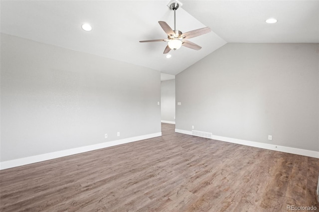 335 N 11th Ave, Brighton, CO 80601 - unfurnished room featuring ceiling fan, vaulted ceiling, recessed lighting, wood finished floors, and baseboards