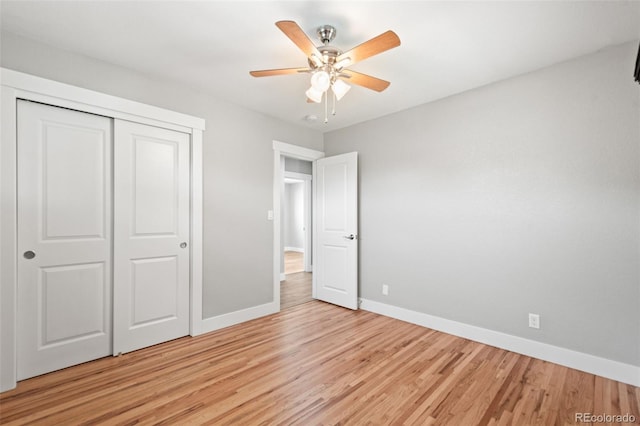 335 N 11th Ave, Brighton, CO 80601 - unfurnished bedroom featuring baseboards, light wood-type flooring, a closet, and a ceiling fan