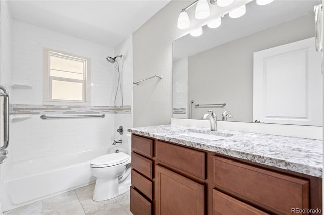 335 N 11th Ave, Brighton, CO 80601 - full bath featuring vanity, tub / shower combination, toilet, and tile patterned flooring