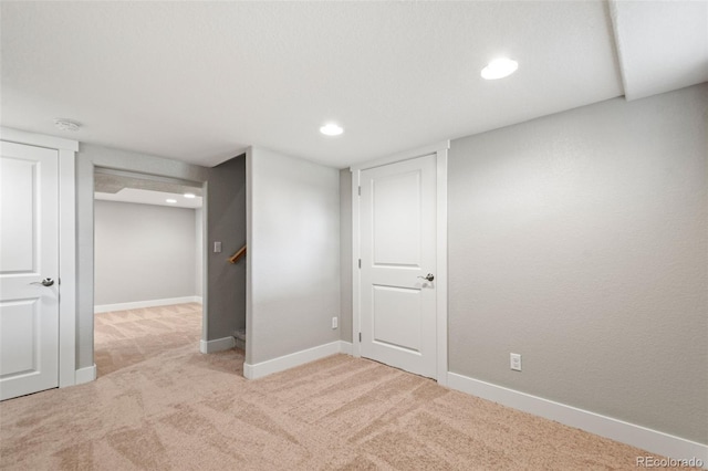 335 N 11th Ave, Brighton, CO 80601 - finished below grade area featuring carpet floors, baseboards, and recessed lighting