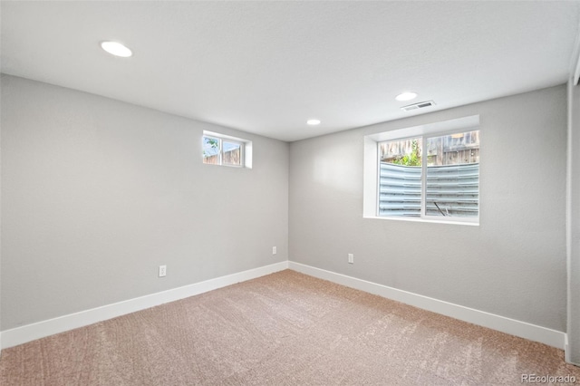 335 N 11th Ave, Brighton, CO 80601 - carpeted empty room featuring plenty of natural light, baseboards, and recessed lighting