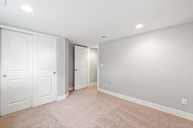 335 N 11th Ave, Brighton, CO 80601 - unfurnished bedroom featuring carpet flooring, a closet, baseboards, and recessed lighting