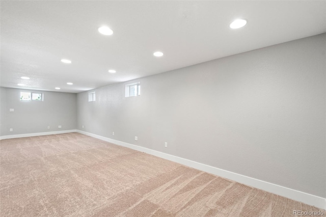 335 N 11th Ave, Brighton, CO 80601 - below grade area featuring recessed lighting, light carpet, and baseboards
