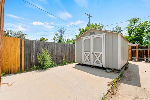 335 N 11th Ave, Brighton, CO 80601 - view of shed with a fenced backyard