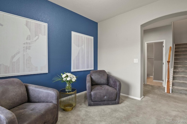 sitting room with light carpet