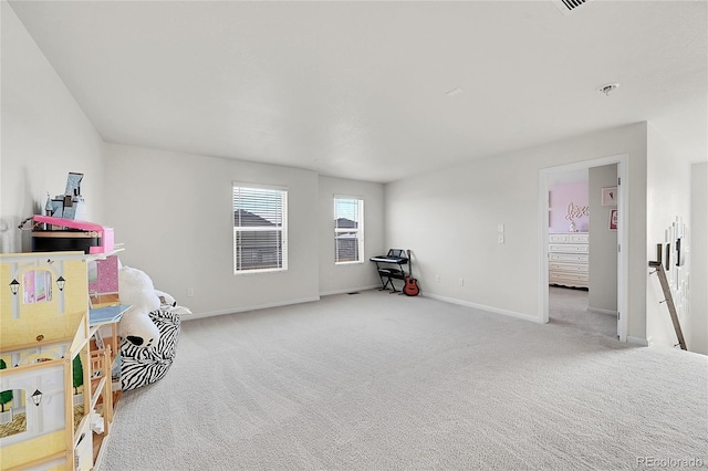 game room with light colored carpet