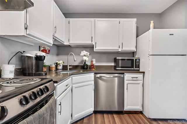 kitchen featuring white cabinetry, stainless steel appliances, and sink