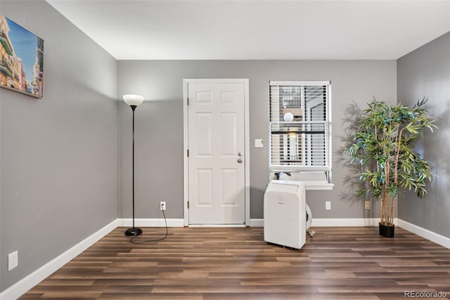 interior space with dark wood-type flooring